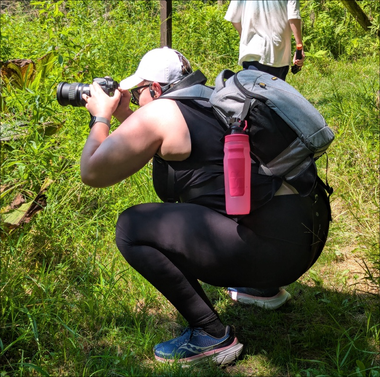 Rhiannon Going for the perfect shot We went for a walk through the state park around quarry lake in Wisconsin and Rhiannon was getting some great shots.